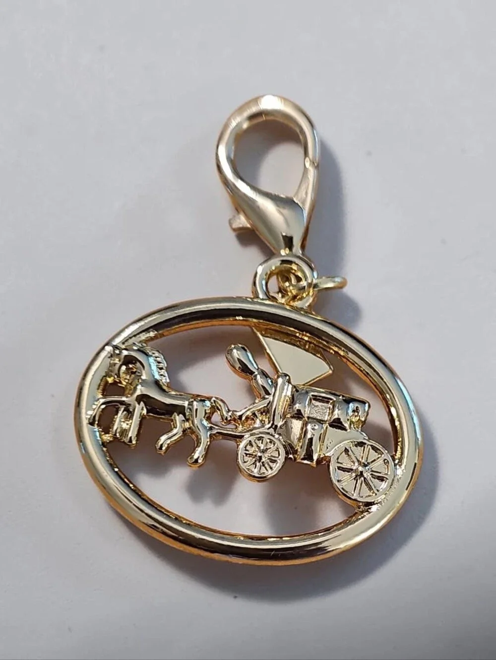 SASSIFIED  BOUTIQUE Nwt Gold Carriage Charm with Red Heart Tag